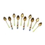 A group of four Norwegian silver gilt and enamel spoons