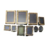 A collection of silver photograph frames,