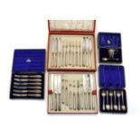 A collection of cased silver flatware,