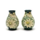 A pair of Moorcroft pottery 'Summer Lawn' pattern vases,