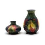 A Moorcroft pottery 'Leaf and Berry' pattern vase