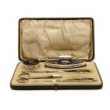 A George V silver manicure set