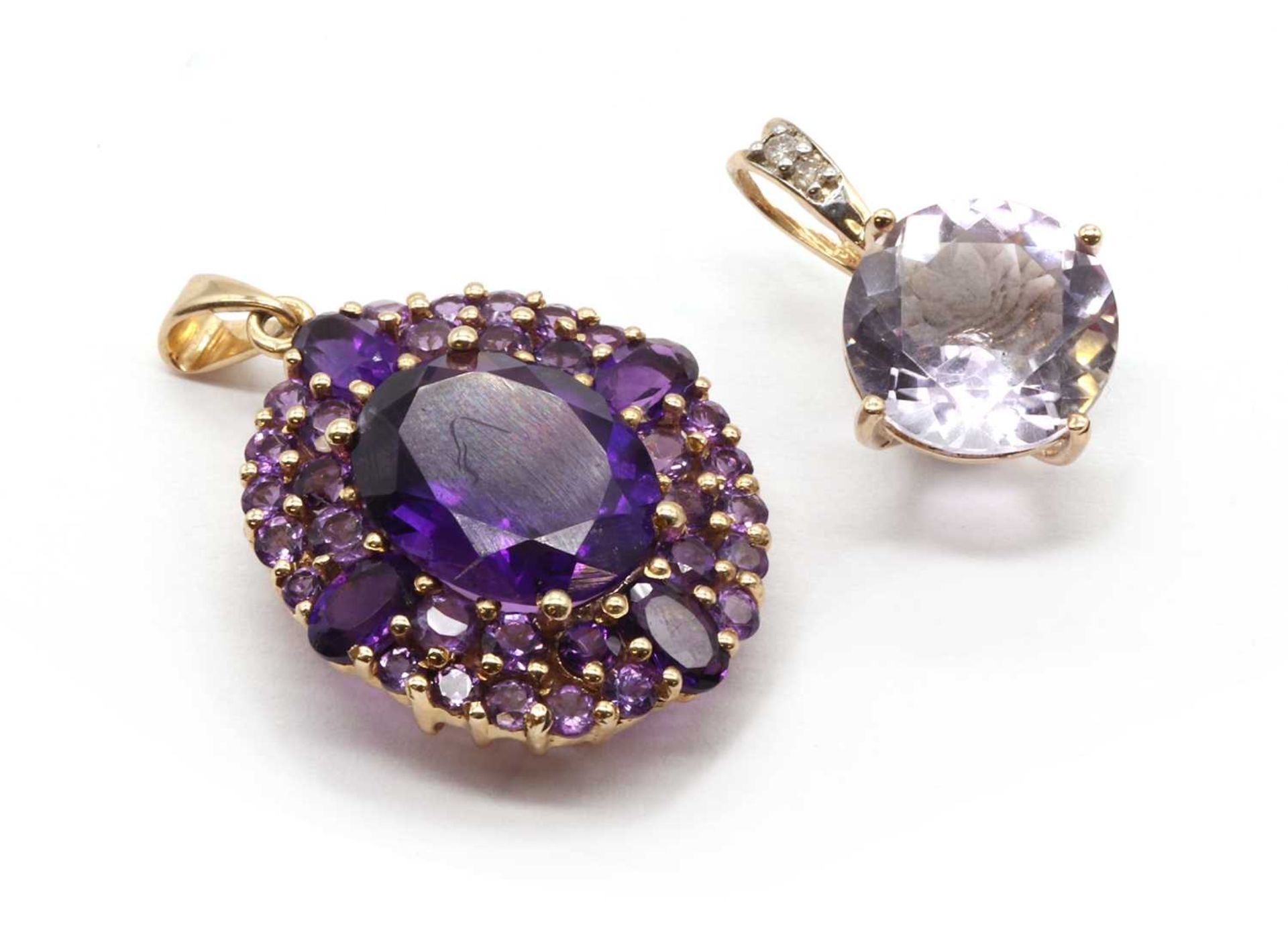 A 9ct gold amethyst cluster pendant,