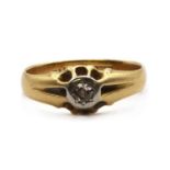 A gold single stone diamond ring,