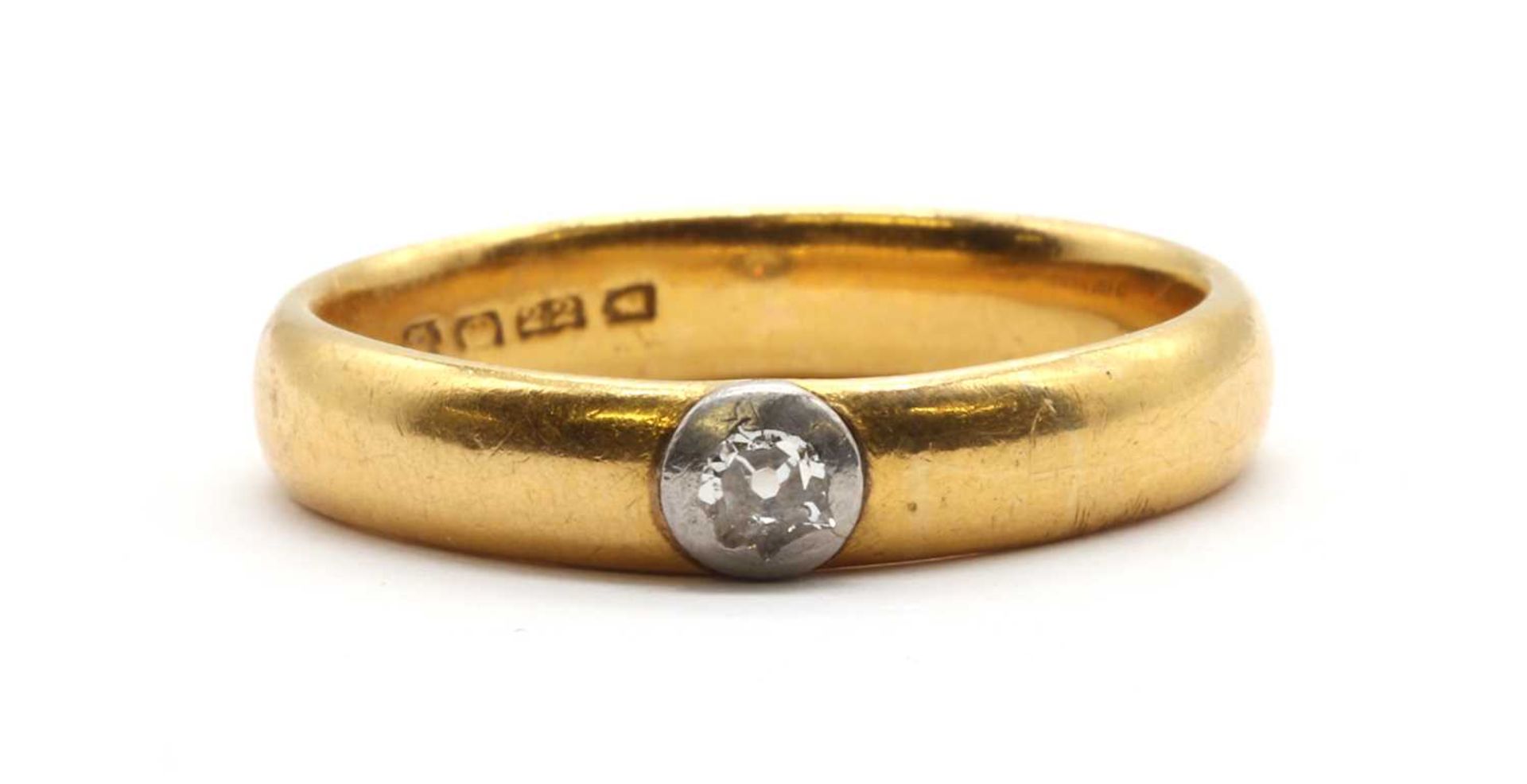 A 22ct gold wedding ring,