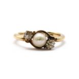 A gold three stone cultured pearl and diamond ring,