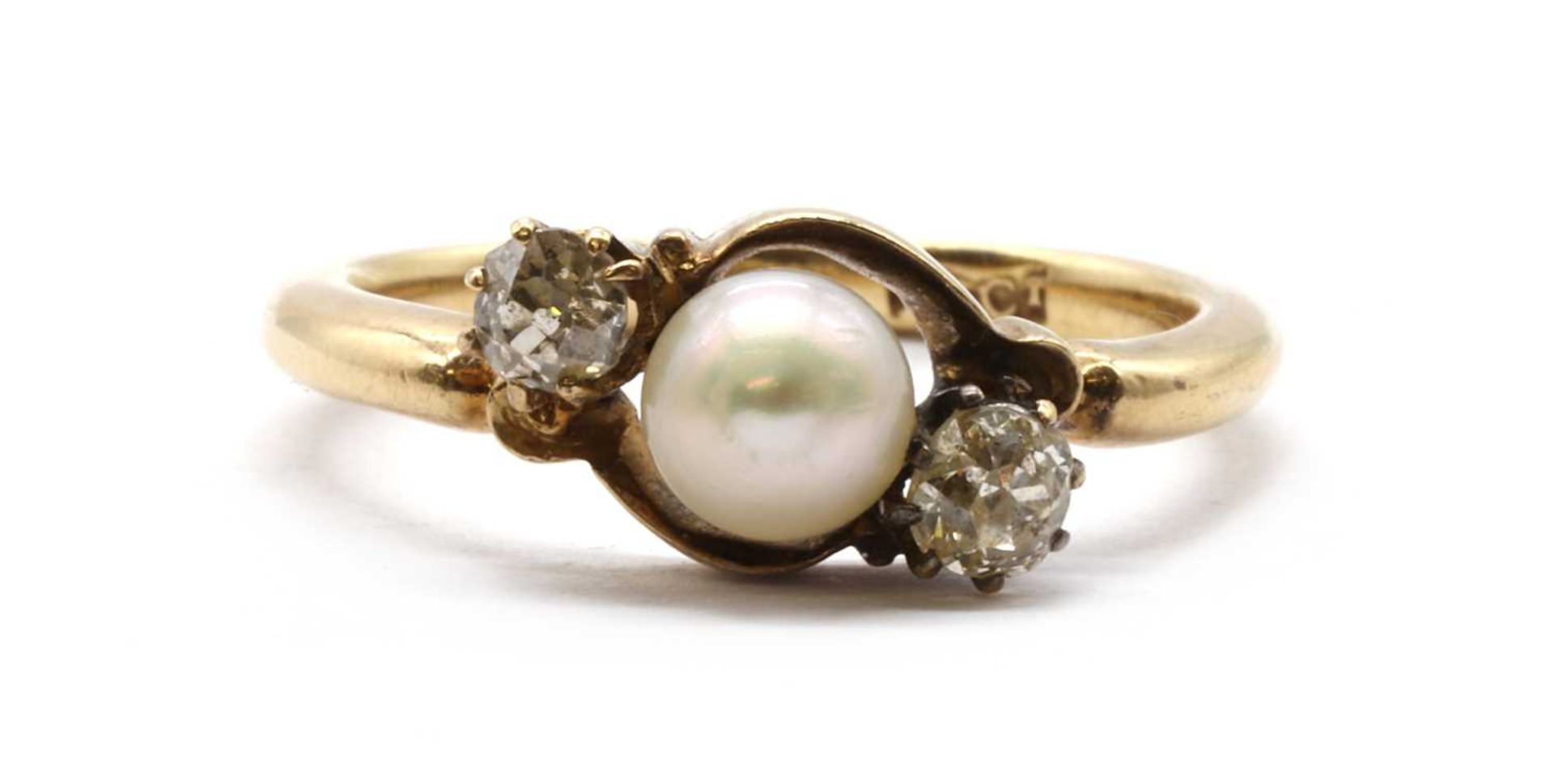 A gold three stone cultured pearl and diamond ring,