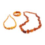 A graduated butterscotch amber bead necklace,