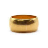 A 22ct gold 'D' section wedding ring,