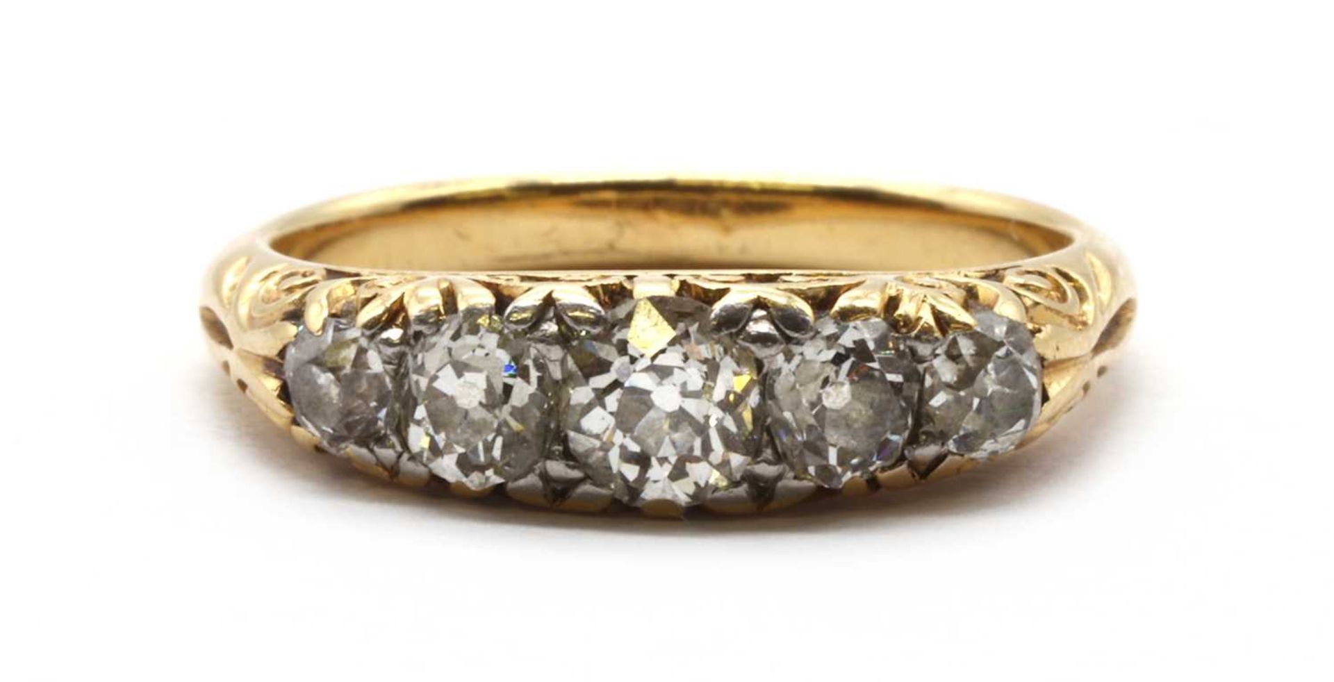 An Edwardian gold five stone diamond ring,