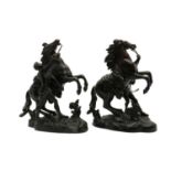 A pair of bronzed Marly horses