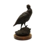 A bronze model of a partridge