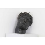 A painted plaster mask,