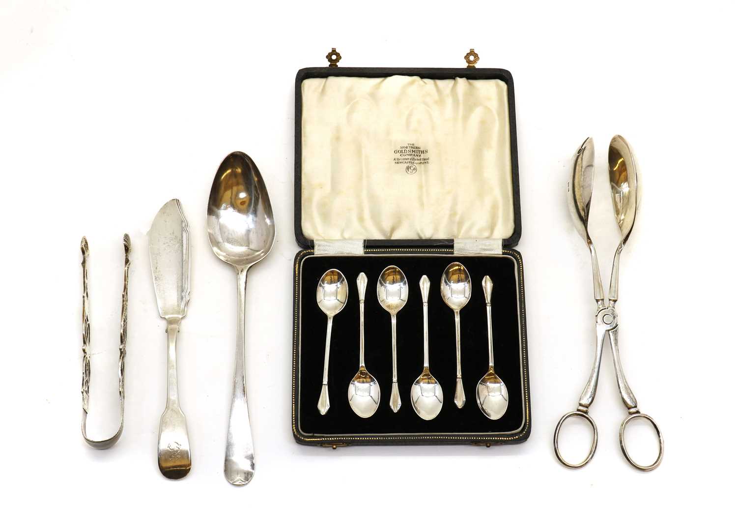 A collection of silver flatware