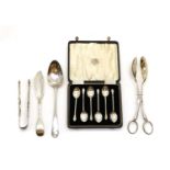 A collection of silver flatware