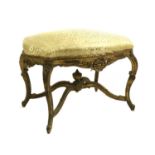 A Rococo style giltwood stool,