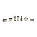 A small collection of silver cruet items,