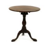 A George II mahogany tripod table,