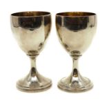 A pair of Victorian silver goblets,