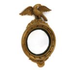 A Regency style convex mirror,