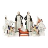 A group of twenty Staffordshire porcelain figures,