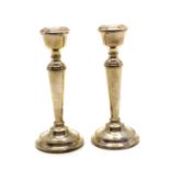 A pair of silver candlesticks