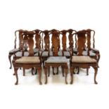 A set of twelve Queen Anne style mahogany dining chairs,