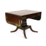 A Regency rosewood and brass inlaid sofa table,