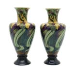 A pair of Gouda pottery vases,