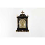 An ebonised musical bracket clock,