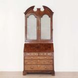 A George I walnut bureau bookcase,