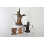 Two Omani copper dallah coffee pots,