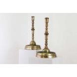 Two gilt-brass candlesticks,