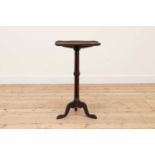 A rosewood tripod table in the manner of Gillows,