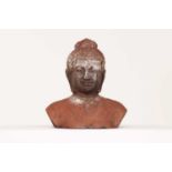 A terracotta bust in the Chinese style,