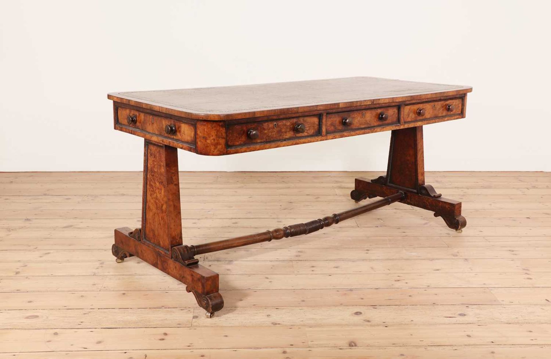 A George IV rosewood and burr yew library table,