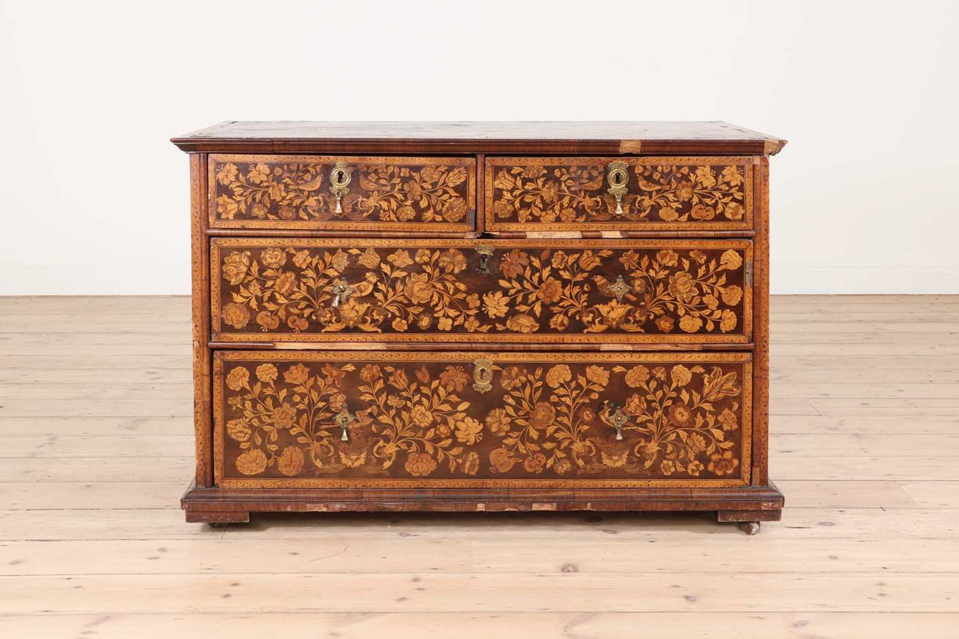 A William and Mary walnut and marquetry chest of drawers,
