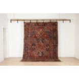 A Persian Heriz wool rug,
