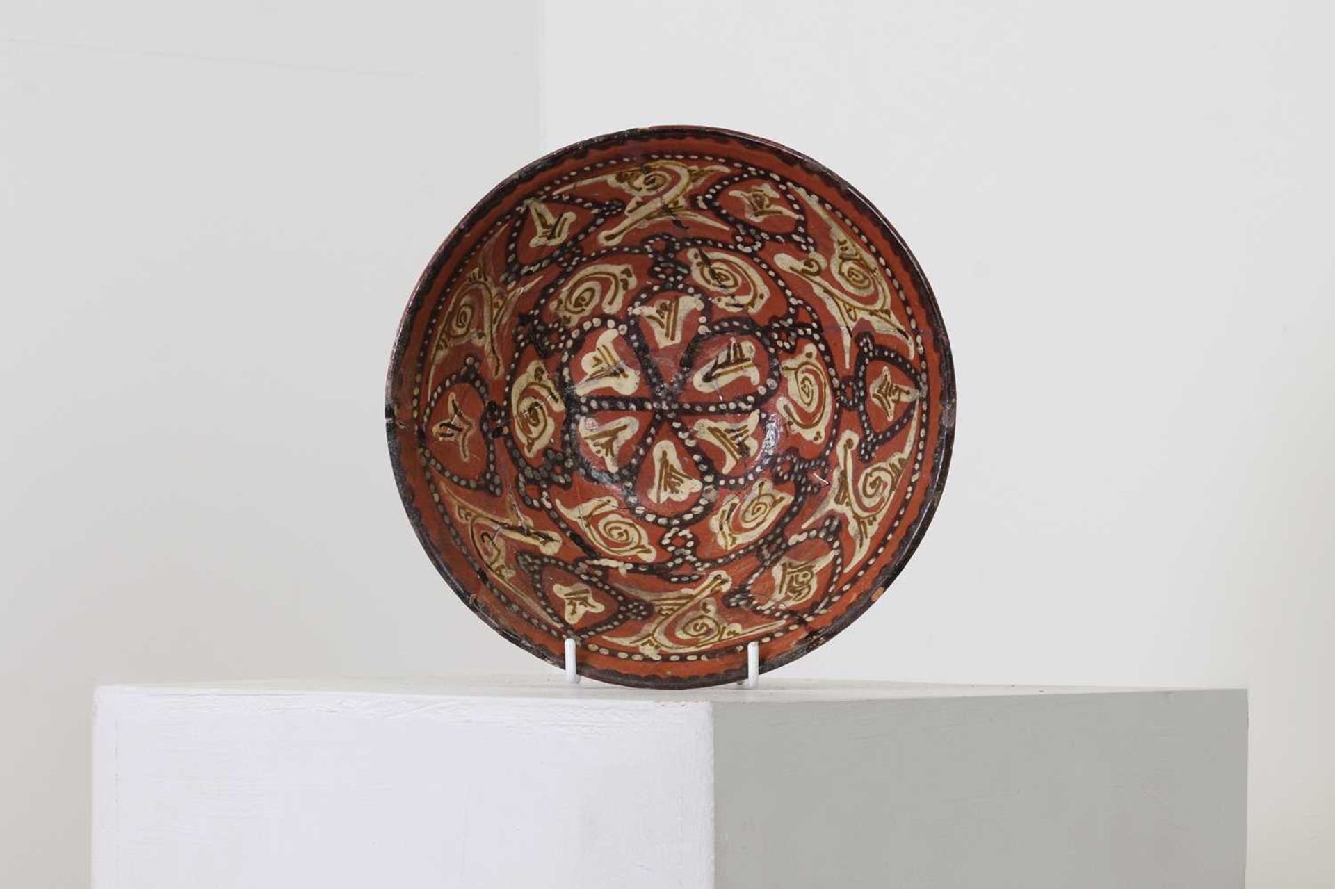 A Persian terracotta glazed bowl, - Image 2 of 4