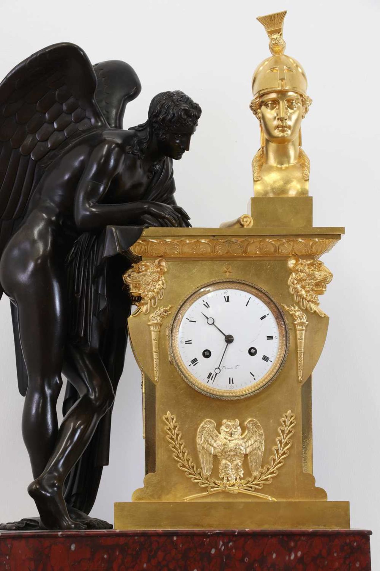 A large Empire ormolu, bronze and marble mantel clock,