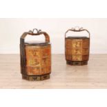A pair of red-lacquered and gilt bamboo food carriers,