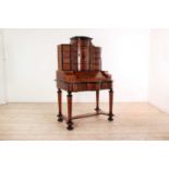 A walnut, marquetry and ebonised secretaire,