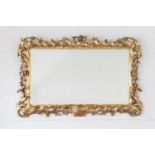 A late George II giltwood picture frame mirror,