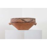 A pottery bowl,