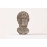 A composite stone bust after the antique,