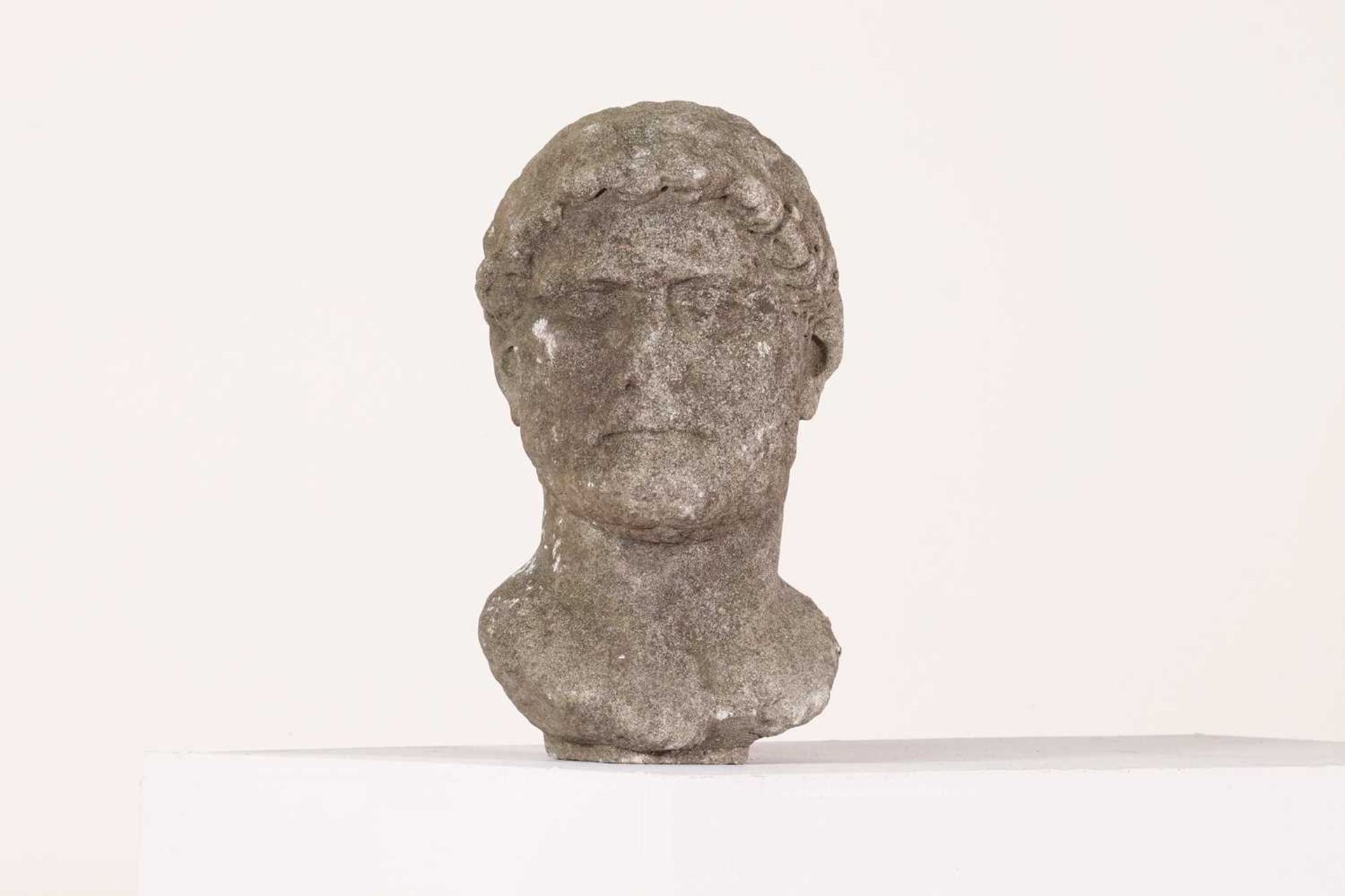 A composite stone bust after the antique,