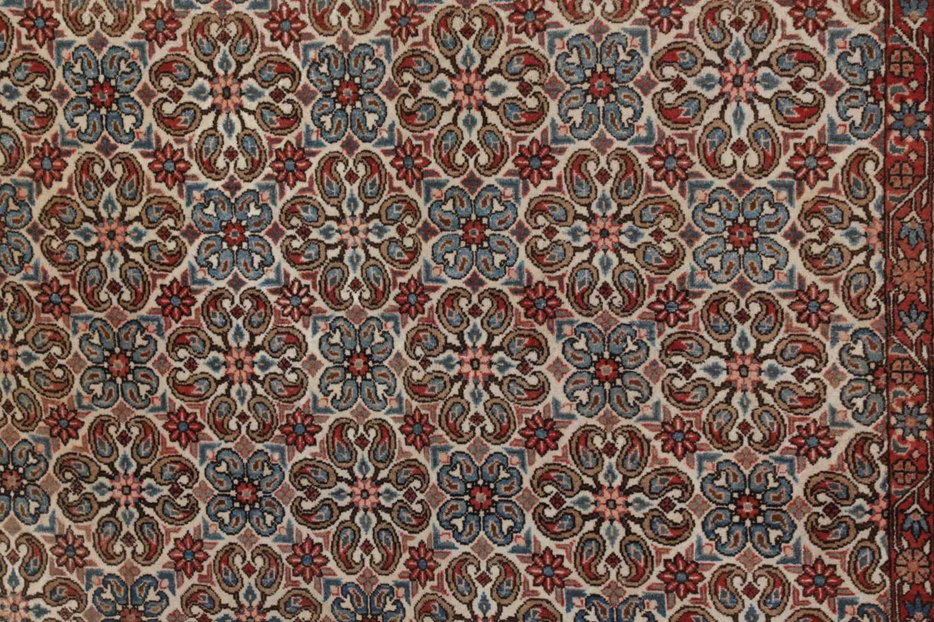 A Persian wool carpet, - Image 4 of 5