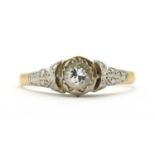 A gold single stone diamond ring,