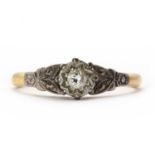 A gold single stone diamond ring,