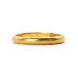 A 22ct gold 'D' section wedding ring,